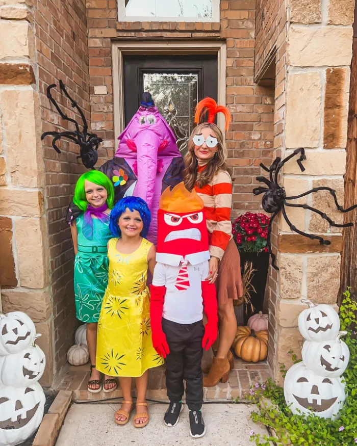 Family in Inside Out costumes including Joy, Disgust, Anger and Bing Bong